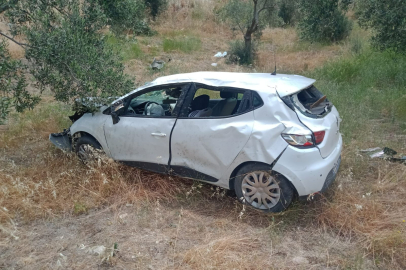 Ayvacık'ta Zeytinliğe Devrilen Otomobilin Sürücüsü Yaralandı