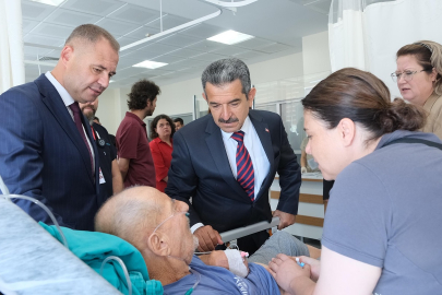 Ekici, Hastanede Tedavi Gören MHP İl Başkanı Savaşan'ı Ziyaret Etti